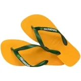 Chancletas Havaianas modelo Brasil Logo, de color blanco, con tiras que incluyen la bandera de Brasil y el nombre de la marca en relieve.