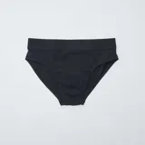 Pack de siete slips negros de punto con cintura elástica.