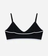 Soutien top seamless texturizado color marrón oscuro con detalles en rosado y ribete blanco, tirantes finos regulables y copas desmontables.