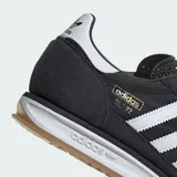 Championes Adidas SL 72 RS negros con detalles en blanco y azul.
