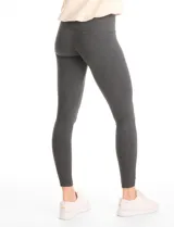 Legging de tiro alto confeccionada en algodón elástico con cintura ancha modeladora. Presenta un calce ajustado y tejido opaco de tacto natural.