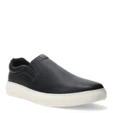 Zapatos tipo slip-on Freeway, confeccionados en cuero negro con paneles elásticos laterales para un calce fácil. Presentan una suela de goma blanca robusta y un diseño ergonómico para mayor comodidad.