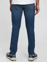 Pantalón de jean skinny de tiro medio, color azul oscuro.