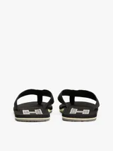 Ojotas negras Tommy Hilfiger con logo en la tira y suela de goma.