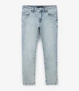 Pantalón de jean skinny celeste con efecto marmolado y lavado dirty.