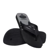 Sandalias tipo ojota Havaianas, con base negra y tiras anchas en color verde militar con textura grabada.