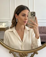 Aros colgantes de plata 925 con diseño de tres círculos decrecientes engastados con circonias brillantes.