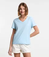 Blusa de algodón de manga corta y cuello en V, de diseño liso en color tostado.