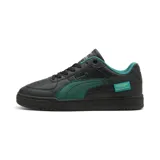 Championes Puma modelo Caven III, edición especial Aston Martin Formula One Team. Diseño en color negro con detalles en verde, confeccionados en cuero sintético con perforaciones en la puntera y suela de goma resistente.