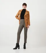 Pantalón legging con estampado pied de poule, cintura elastizada y corte ajustado.