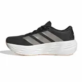 Championes de running Adidas Galaxy 8 W para mujer, de color negro con suela blanca amortiguada, entresuela esculpida y detalles reflectantes.