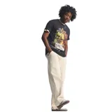 Remera Adidas color negro de manga corta, con estampa frontal de Bob Marley y la leyenda "Football is freedom", además del logotipo clásico de la marca.