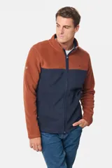 Campera de micro polar bondeado con diseño bicolor, combinando paneles en color terracota y azul marino. Presenta cuello alto, cierre frontal completo y bolsillos laterales con cierre.
