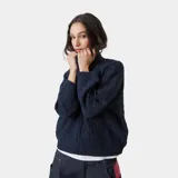 Suéter de punto texturizado color azul marino, con patrón de tejido tipo cesta, cuello redondo y puños y bajo de canalé. Incluye un sutil logotipo tejido en la parte frontal.