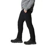 Pantalon de trekking para hombre, color negro, confeccionado en tejido elástico con tecnología Omni-Shield repelente al agua y forro termorreflectante Omni-Heat. Cuenta con cinturón integrado, bolsillos laterales, bolsillo de seguridad con cremallera y aberturas con cierre en los tobillos.