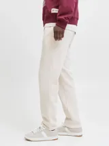 Pantalon de buzo color beige, corte recto, confeccionado en tejido de algodón con cintura elastizada.