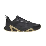 Championes Under Armour Charged Commit TR 5 color negro con suela y detalles en tostado, diseñados para running y entrenamiento.