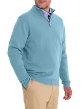 Sweater celeste de punto con cuello alto y medio cierre frontal, confeccionado en mezcla de lana extrafina y cashmere, de manga larga y calce regular.