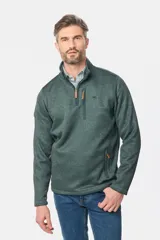 Buzo de felpa con interior de polar, diseño de medio cierre frontal, cuello alto y bolsillos laterales y en el pecho con cierres.