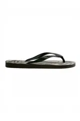 Chancletas Havaianas modelo Aloha en color beige con estampado tropical de hojas en negro y tiras finas texturizadas.