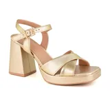 Sandalias de tacón alto Usaflex Party color beige, con capellada de cuero, forro Usa Care y tiras cruzadas en el empeine.