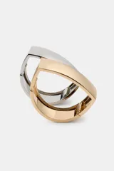 Pack de dos pulseras metálicas articuladas, una dorada y una plateada, con cierre de imán.