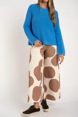 Sweater celeste de tejido de punto calado con lurex, de corte holgado y mangas largas.