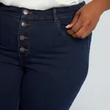 Pantalón de jean skinny de tiro alto, color azul oscuro, con cinco bolsillos y cierre frontal con botones.