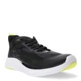 Championes Topper VR Pro negros con detalles en amarillo flúor y suela blanca.