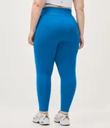 Pantalón legging deportivo Get Over de color azul, confeccionado en microfibra con cintura alta y ancha, recortes anatómicos y bies contrastante blanco a los lados.
