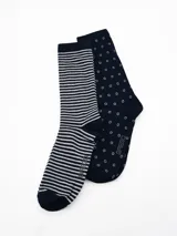 Pack de dos pares de medias de caña media marca Grego. Un par presenta diseño de rayas horizontales finas y el otro par tiene un estampado de pequeños círculos sobre fondo oscuro.