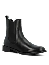 Botas tipo Chelsea de cuero negro con paneles elásticos laterales, suela de goma y taco cuadrado bajo.