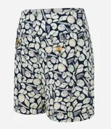 Short de tiro alto confeccionado en viscolino con estampa de caracoles, bolsillos delanteros con botones y detalle de pespunte.