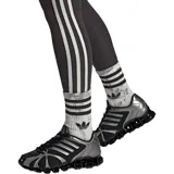 Championes adidas Mega Ghostride de diseño técnico, con capellada de malla negra y refuerzos sintéticos plateados. Presenta el icónico sistema de amortiguación de cápsulas en la suela y las tres tiras características de la marca en los laterales.