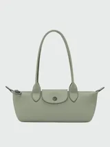 Cartera de hombro pequeña Longchamp de la línea Le Pliage Xtra, color amarillo, de diseño estructurado con doble asa y solapa con cierre de botón a presión.