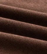 Suéter de punto marca Marfinno, color marrón, con diseño liso, cuello redondo, manga larga y bajo ajustado con rib.