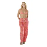 Pantalón de jogging Rip Curl Keepsakes Terry, color salmón con estampado de flores rosas.