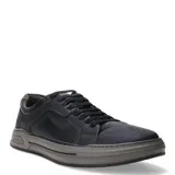 Championes urbanos Democrata modelo Nosu, confeccionados en cuero marrón con textura. Presentan cierre mediante cordones al tono, suela de goma gris con detalle de marca grabado en el talón y puntera con detalle microperforado.