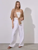 Bolero calado negro de poliéster con mangas 3/4 y frente abierto con lazo.