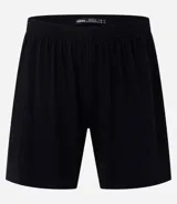 Conjunto de pijama para hombre, compuesto por remera de algodón color crudo con cuello redondo, mangas cortas y estampado de Garfield en un sillón, y short negro de algodón con cintura elástica.