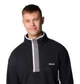 Polar Columbia Helvetia Half Snap de color negro, con cuello alto abotonado mediante broches, ribete en contraste y bolsillo frontal con cierre y tirador.