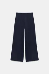 Pantalón ancho azul marino de tiro medio con cintura elástica, confeccionado con hilatura de algodón.