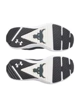 Championes de entrenamiento Under Armour Project Rock BSR 5, color negro con suela blanca. Presentan una parte superior de malla transpirable con refuerzos sintéticos y de gamuza, mediasuela Charged Cushioning para amortiguación reactiva y tecnología UA TriBase para mayor estabilidad y agarre.