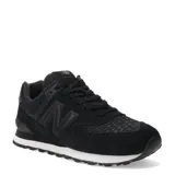 Championes urbanos New Balance modelo 574, color negro con textura de piel de serpiente en la puntera y laterales. Presentan el logo N característico en los costados, entresuela blanca con detalles moteados y suela de goma negra.
