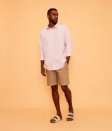 Camisa de manga larga Marfinno con cuello camisero y cierre frontal de botones. Confeccionada en tejido plano de lino y algodón.