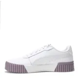 Championes Puma Carina 2.0 de mujer, color blanco, con logo Puma en dorado y suela de plataforma con textura acanalada en color lila/malva.