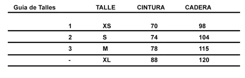 Pantalón babucha color beige de algodón, con corte a la cintura y piernas levemente amplias. Presenta textura de tablitas centrales y elásticos con broches inferiores que ajustan las piernas al tobillo.