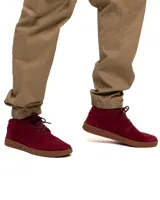 Pantalón cargo beige con múltiples bolsillos utilitarios, cintura elástica y puños elastizados en los tobillos.