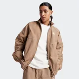 Campera marrón con cierre frontal, cuello alto y ribetes blancos. Logo de Converse bordado en el pecho.