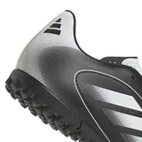 Championes de fútbol Adidas Goletto IX para pasto sintético, color negro con detalles en blanco. Exterior sintético suave con acolchado y perforaciones. Suela de caucho con taches. Ajuste clásico y cierre de cordones.